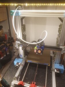 Printer with bowden tube running to the extruder