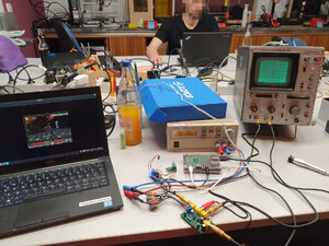 Test setup with one lab power supply (12V) and a USB wall wart